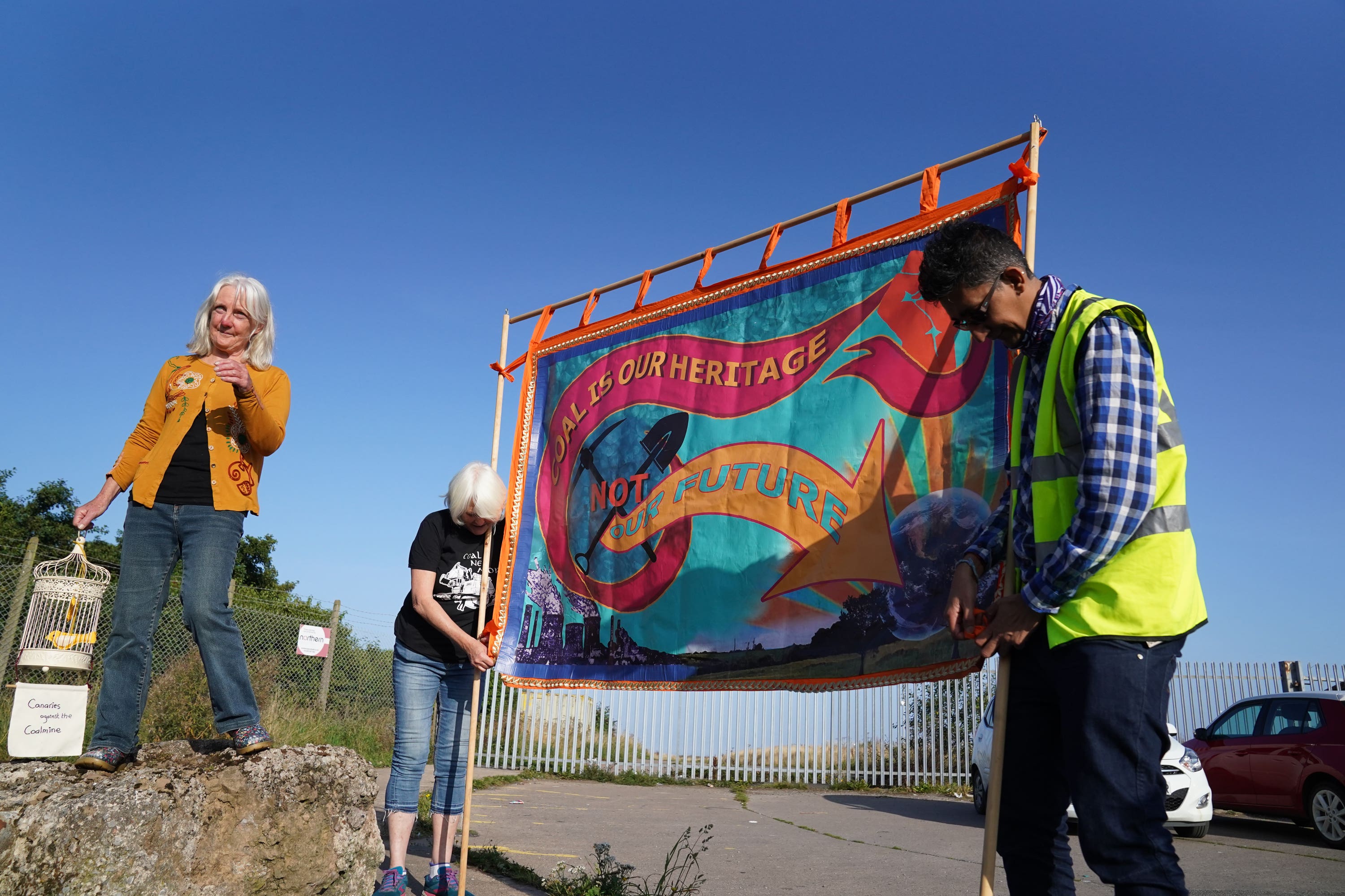 Demonstrators outside the proposed Woodhouse Colliery, south of Whitehaven (Owen Humphreys/PA)