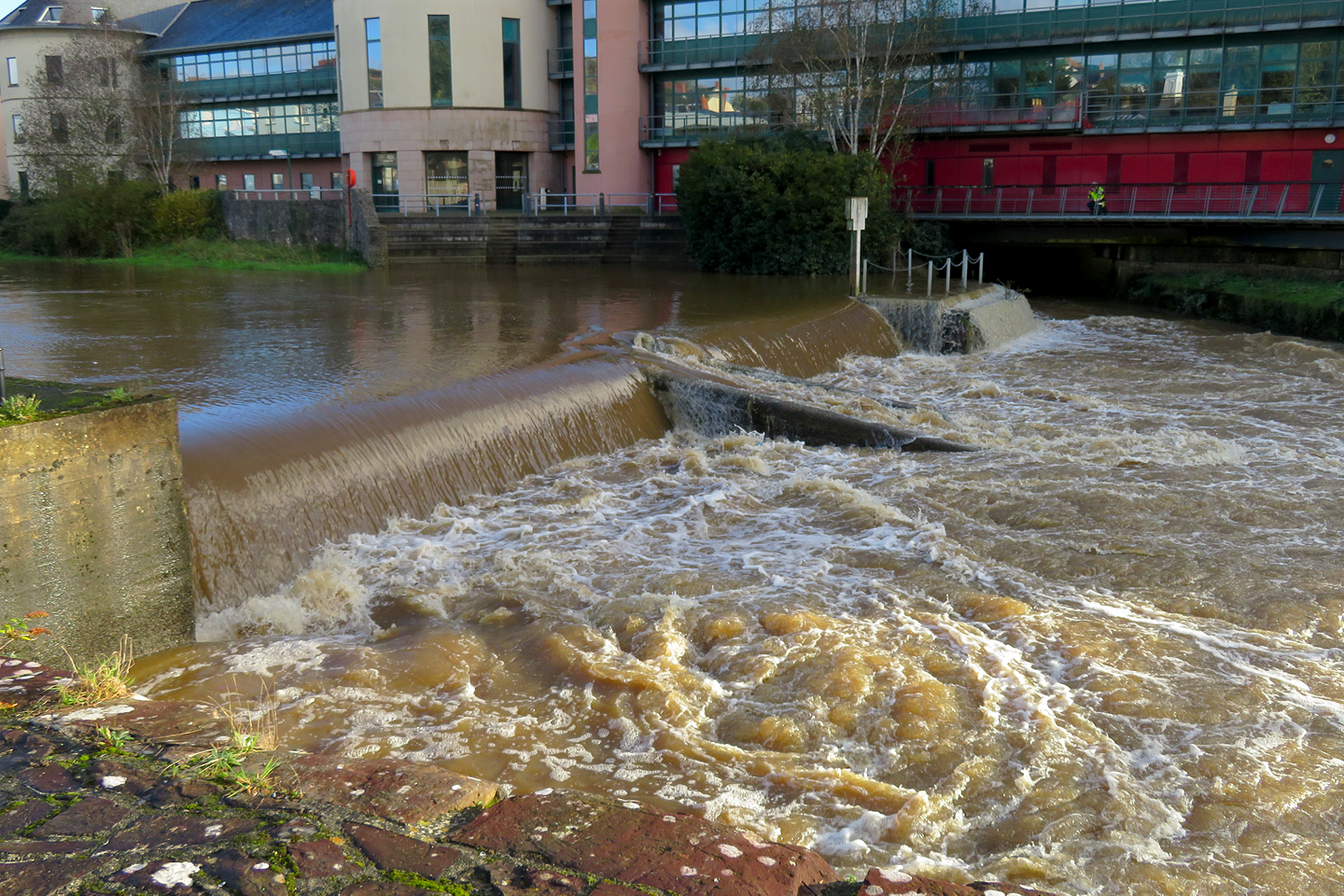 The victims drowned when they fell from their paddleboards as they descended Haverfordwest Town Weir (CIRIA/PA)