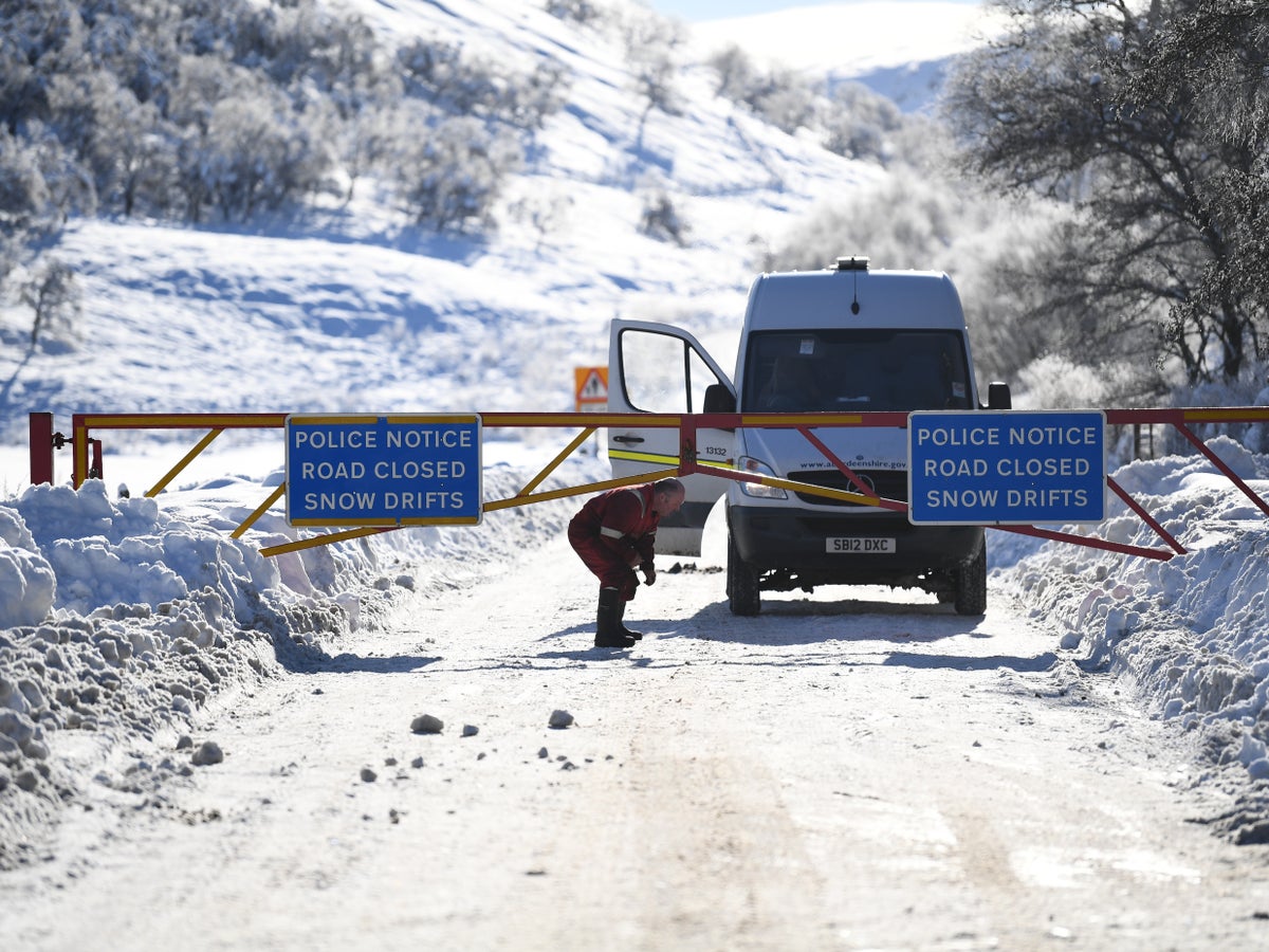UK weather: Schools closed as snow causes travel disruption in severe cold snap