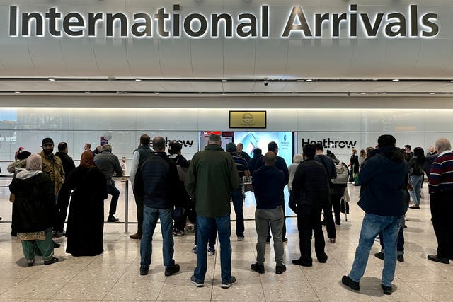 <p>Waiting game: International Arrivals at London Heathrow Terminal 5</p>