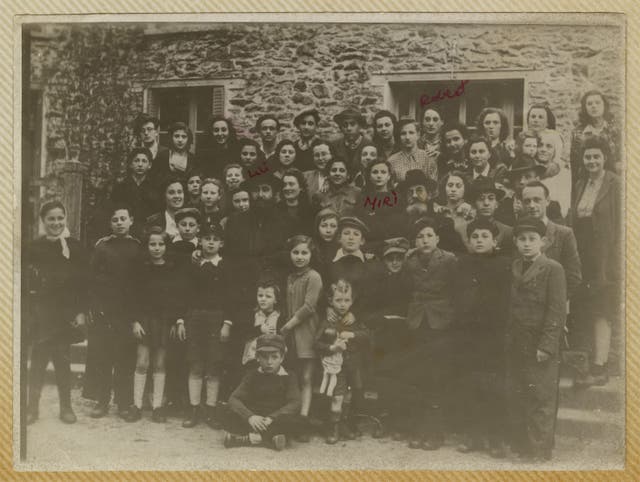 <p>Blanche Fixler, middle front between two smaller children, spent some time in a displaced person's camp in France after WW2 ended</p>