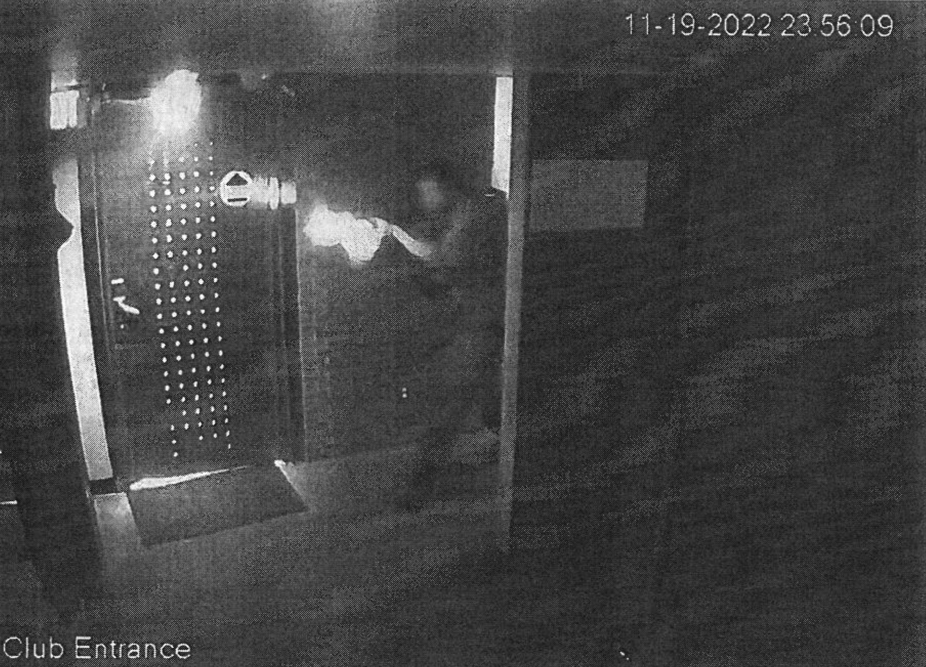 A surveillance image in an unsealed arrest affidavit allegedly shows suspected shooter Anderson Lee Aldrich firing into Club Q.