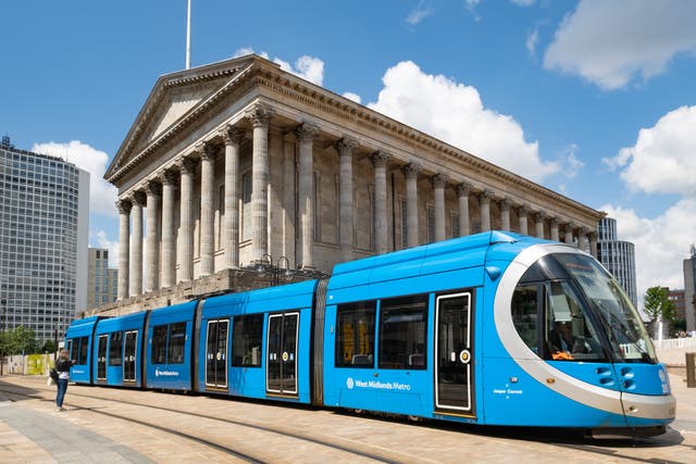 <p>A West Midlands Metro tram in front of Birmingham Town Hall in Victoria Square. The system currently has one line, running between Birmingham and Wolverhampton</p>