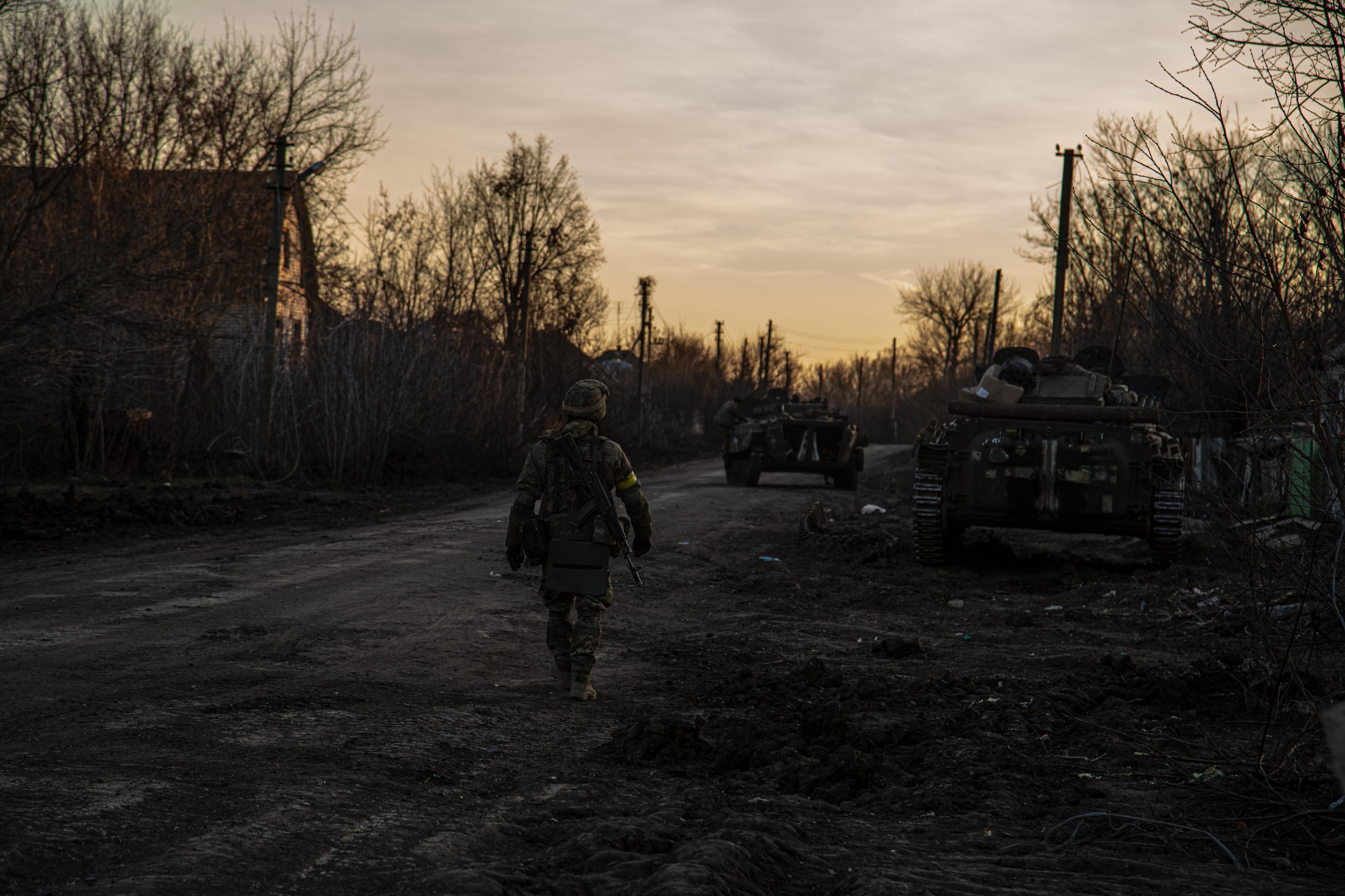 A Ukrainian military unit moves toward a front-line position near Kreminna on Sunday