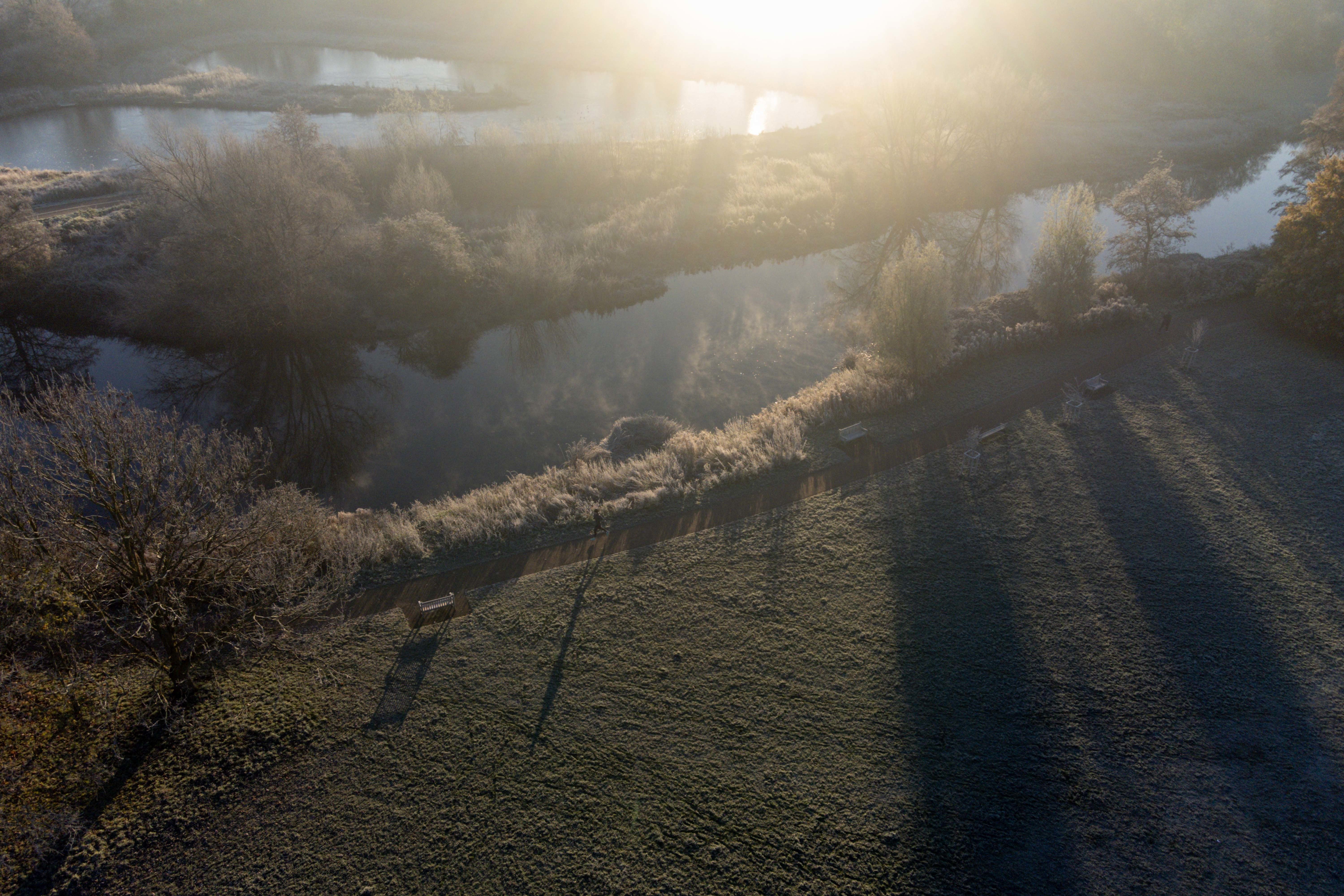 A runner braves the cold at St Nicholas’ Park, Warwick