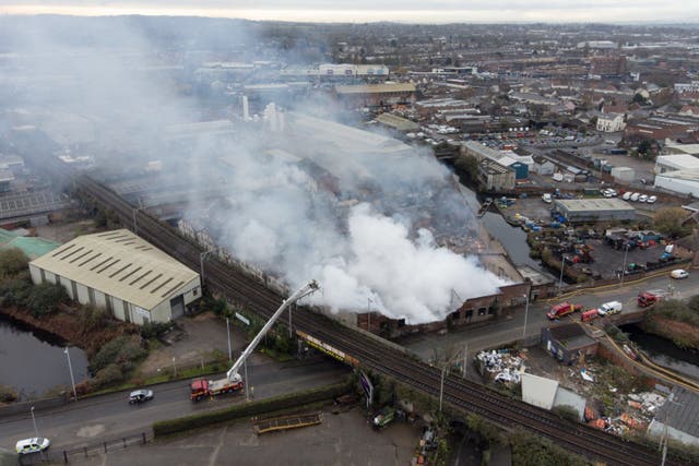 Firefighters at the scene (Jacob King/PA)