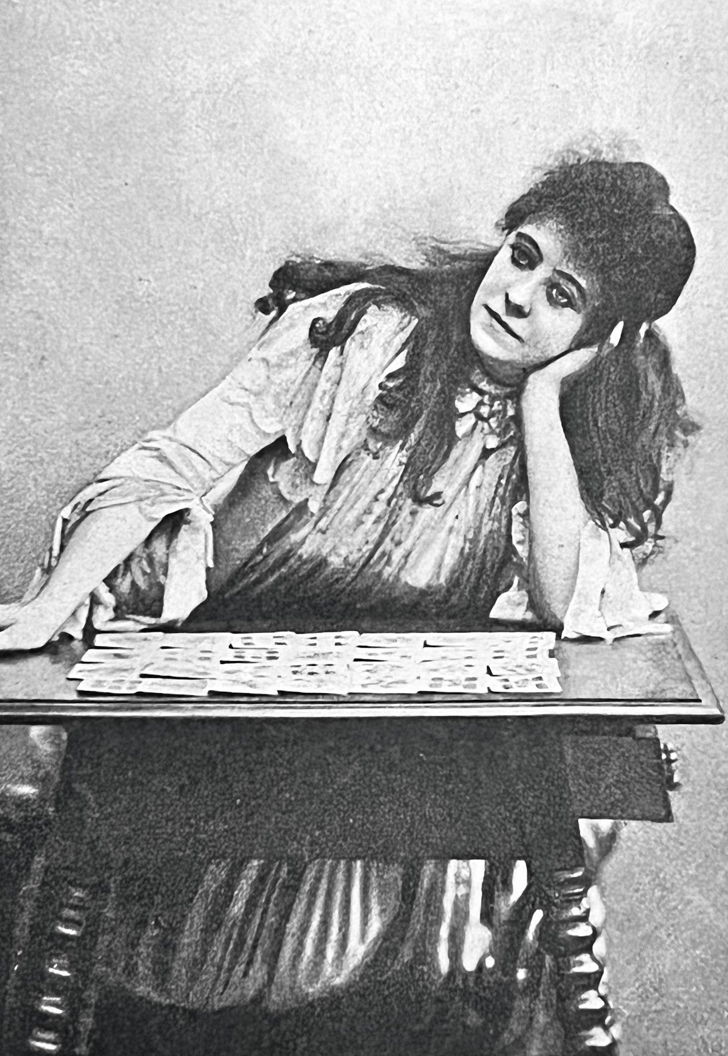 A 19th-century fortune teller with her deck of tarot cards