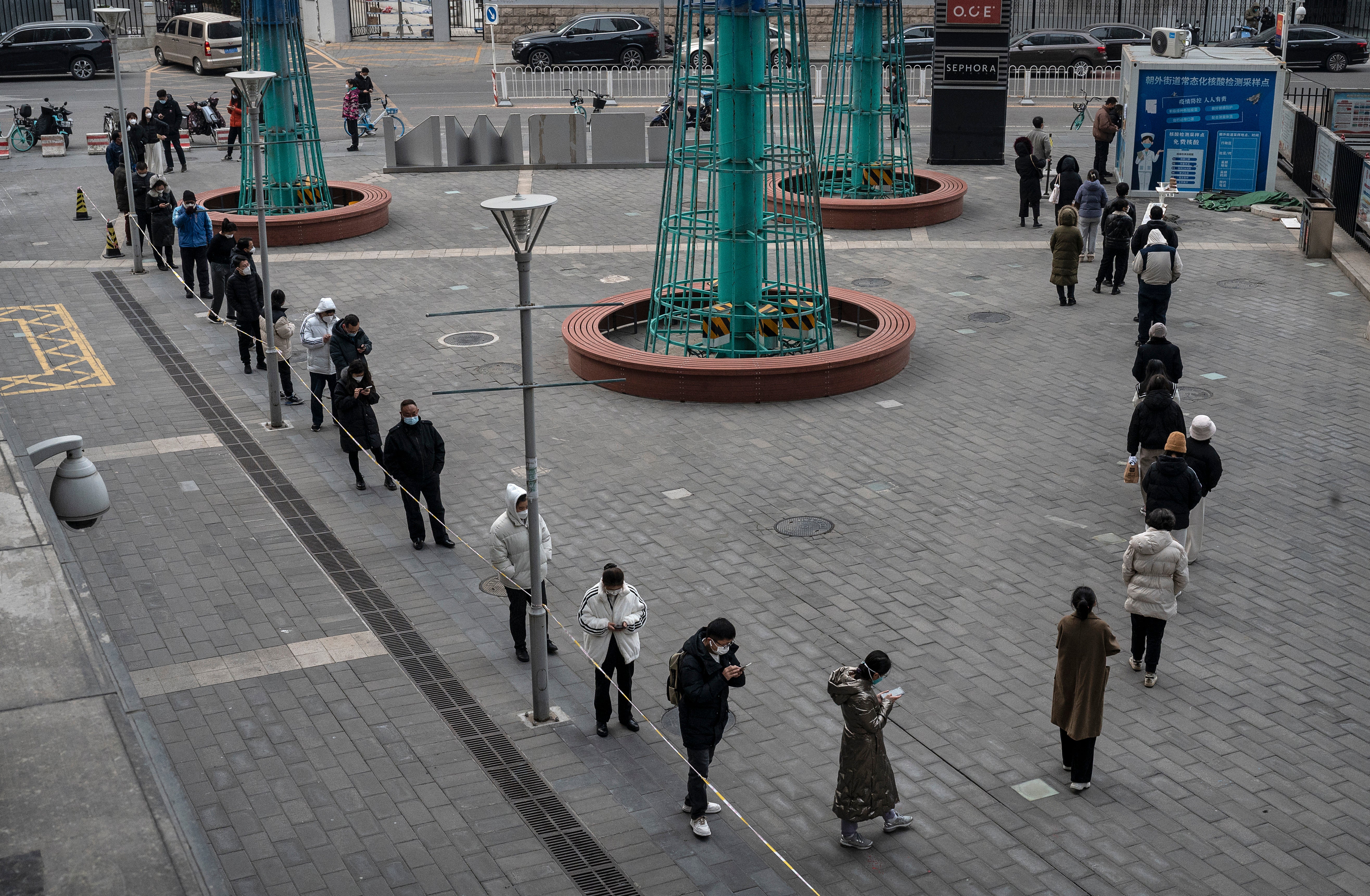 People line up for Covid-19 tests at a public testing site