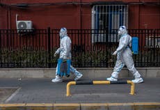 ‘We are accepting the new reality’: China prepares for exit wave of Covid infections