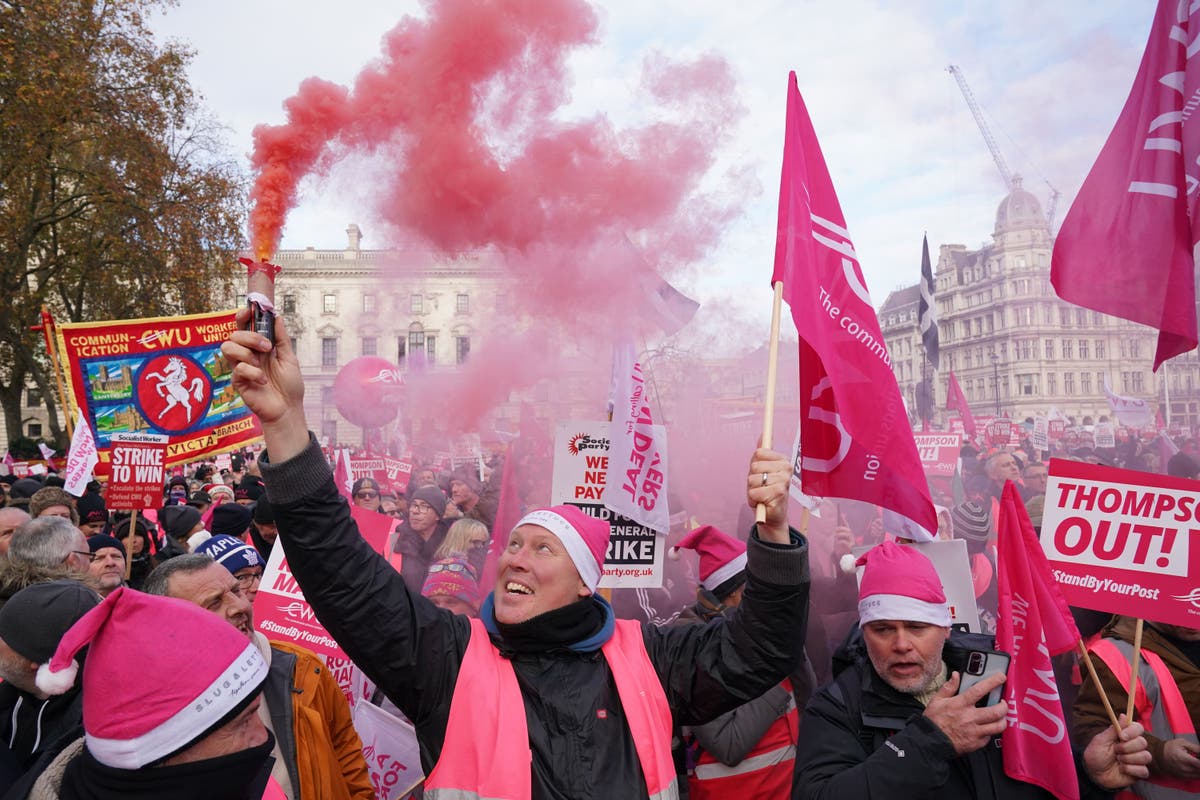 Thousands of striking Royal Mail workers stage rally near Parliament