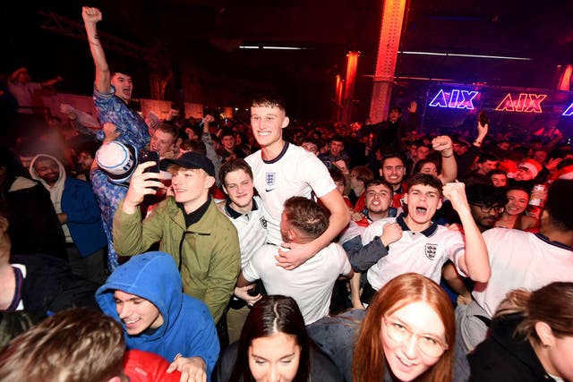 England fans at the Mayfield Depot in Manchester celebrate (Peter Powell/PA)