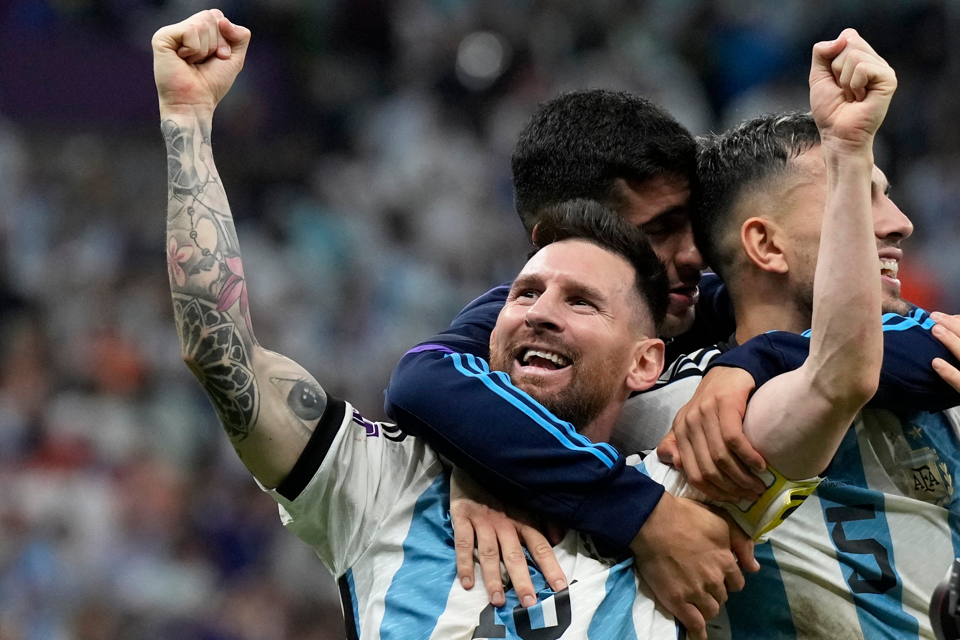 Lionel Messi celebrates victory over the Netherlands