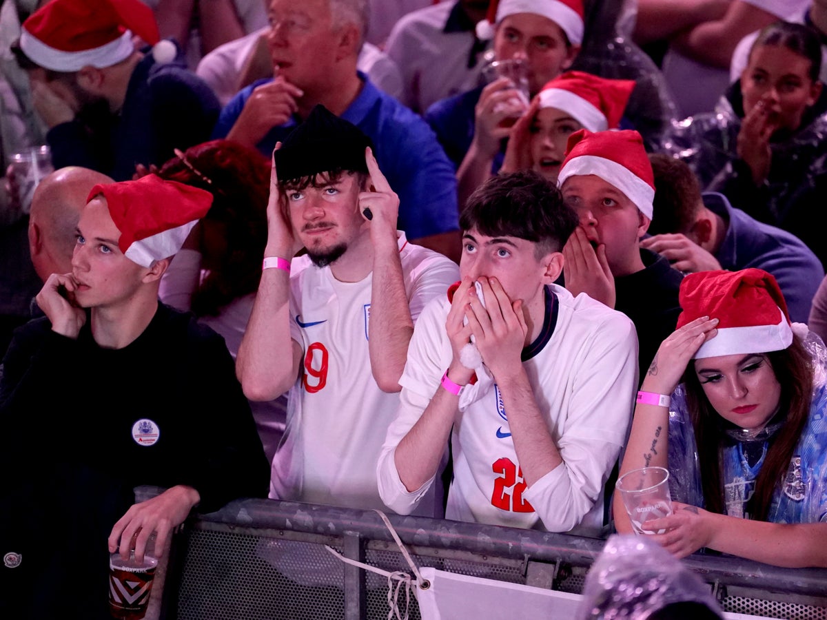 Heartbroken England fans watch World Cup exit as French supporters ‘turn London blue’