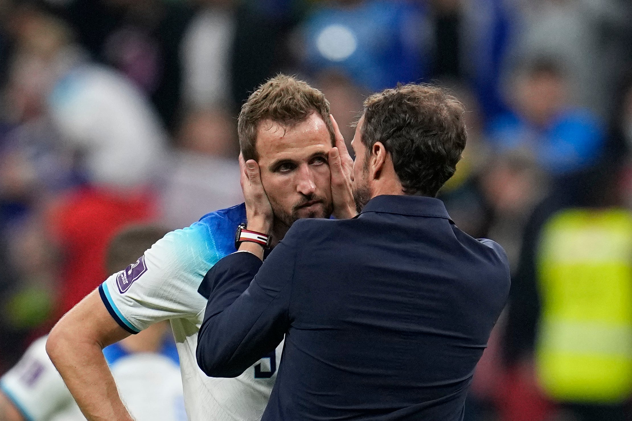 Harry Kane is consoled by Gareth Southgate at full-time