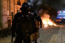 At least 74 arrested after football fans clash with police in Paris after France beat England in World Cup
