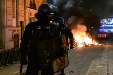 At least 74 arrested after football fans clash with police in Paris after France beat England in World Cup