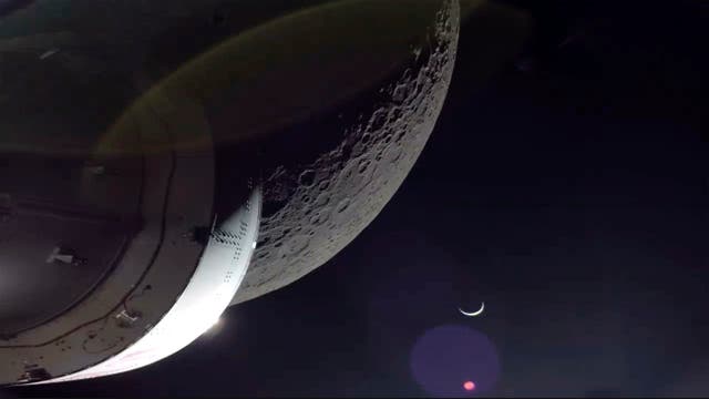<p>A photo of the moon taken from the Orion space capsule  </p>