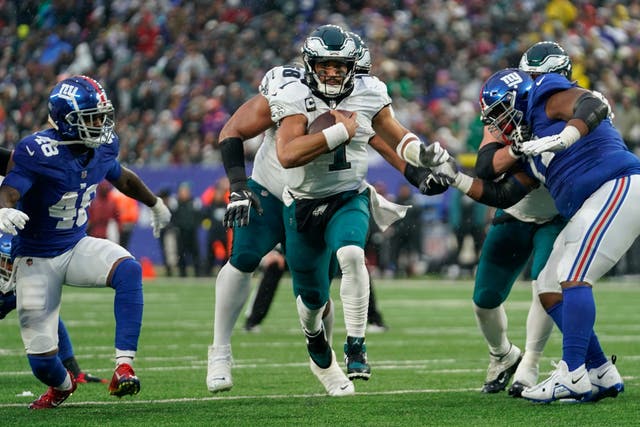Philadelphia Eagles quarterback Jalen Hurts threw for 217 yards and ran in for a touchdown himself (Bryan Woolston/AP)