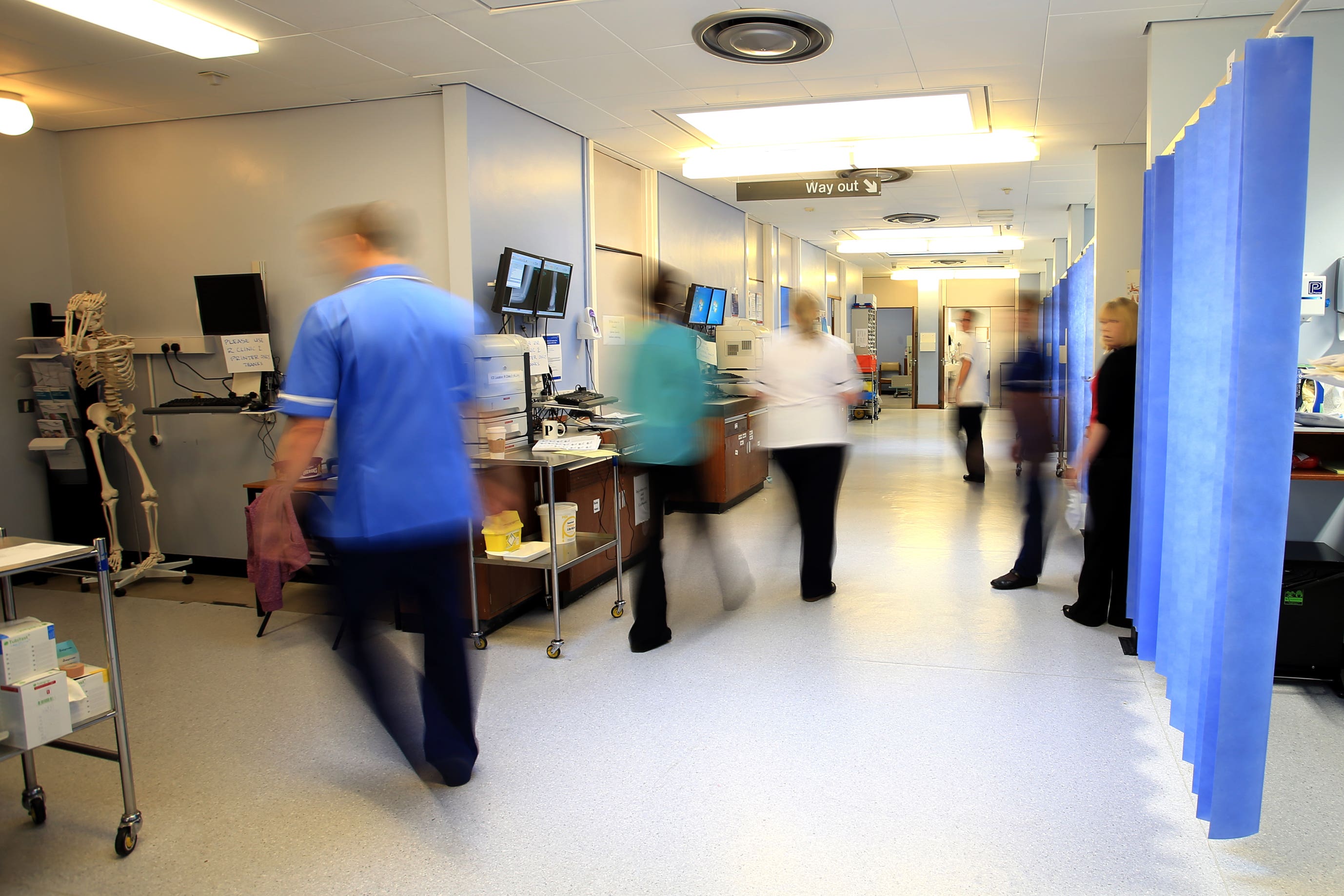 Staff on a NHS hospital ward (Peter Byrne/PA)