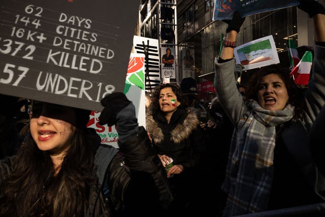 <p>Protesters call on the United Nations to take action against the treatment of women in Iran during a demonstration in Times Square last month </p>