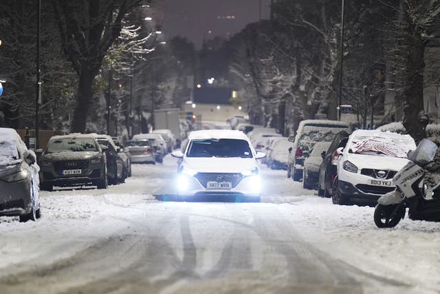 <p>Commuters have faced difficult driving conditions (James Manning/PA)</p>