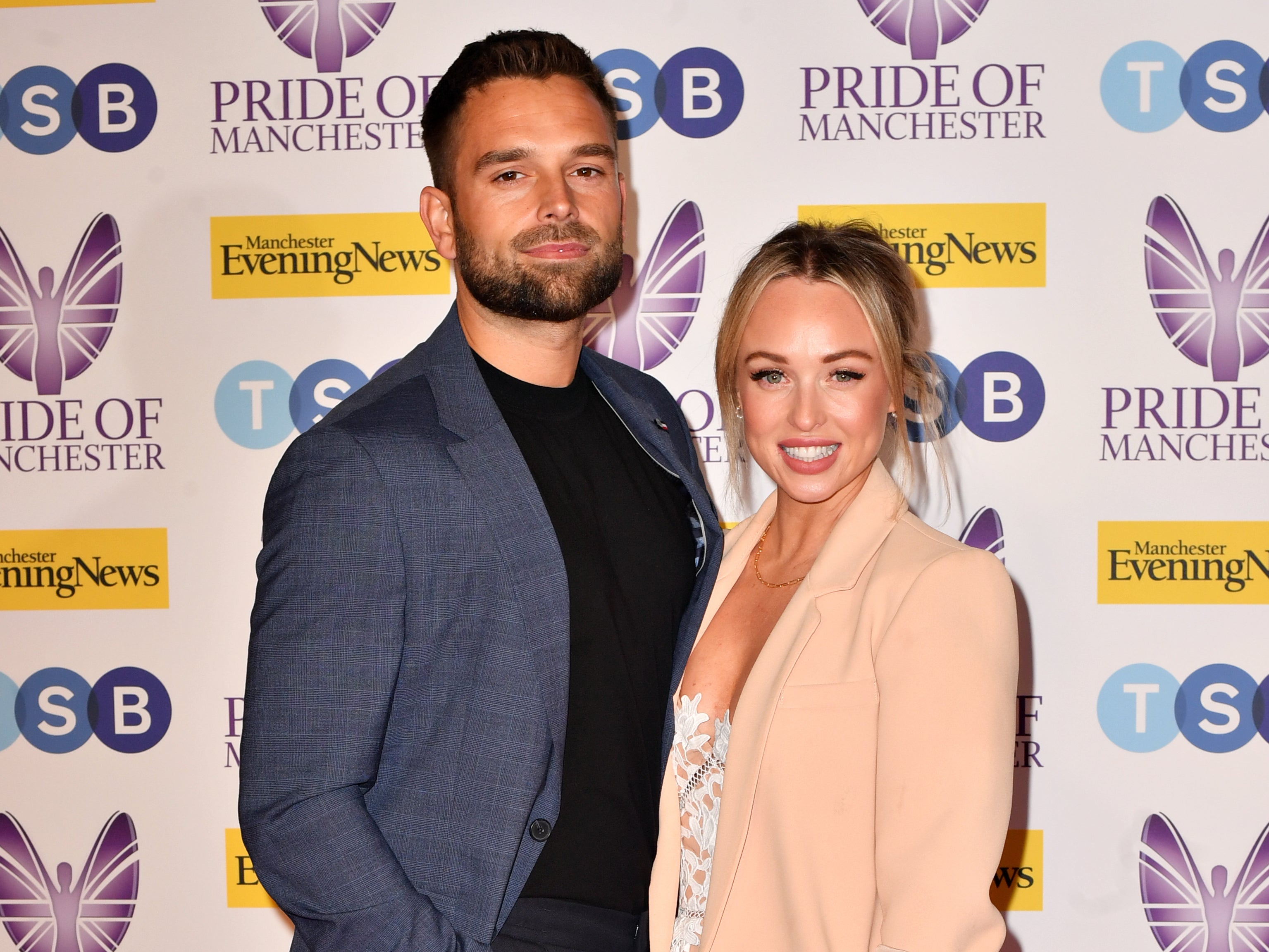 Jorgie Porter (R) and Ollie Piotrowski (L) attend the MEN Pride of Manchester Awards 2022 at Kimpton Clocktower Hotel on May 10, 2022