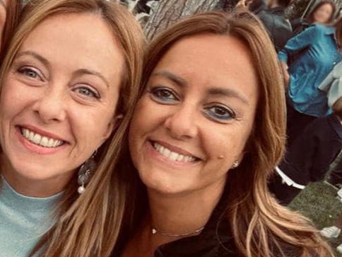 Giorgia Meloni (left) shared a photo of herself with Nicoletta Golisano
