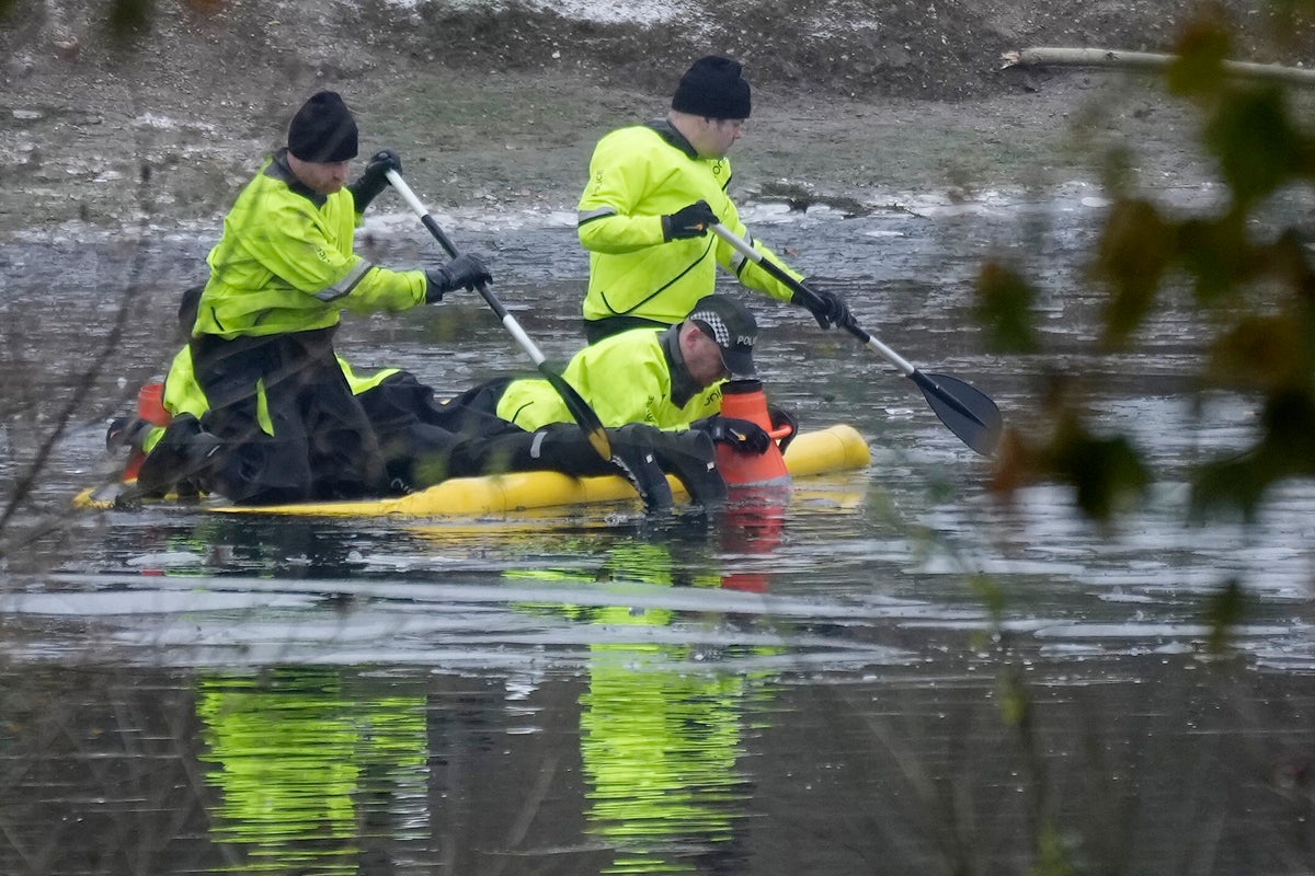 Police officer punched through ice to try and rescue children as three die in frozen lake