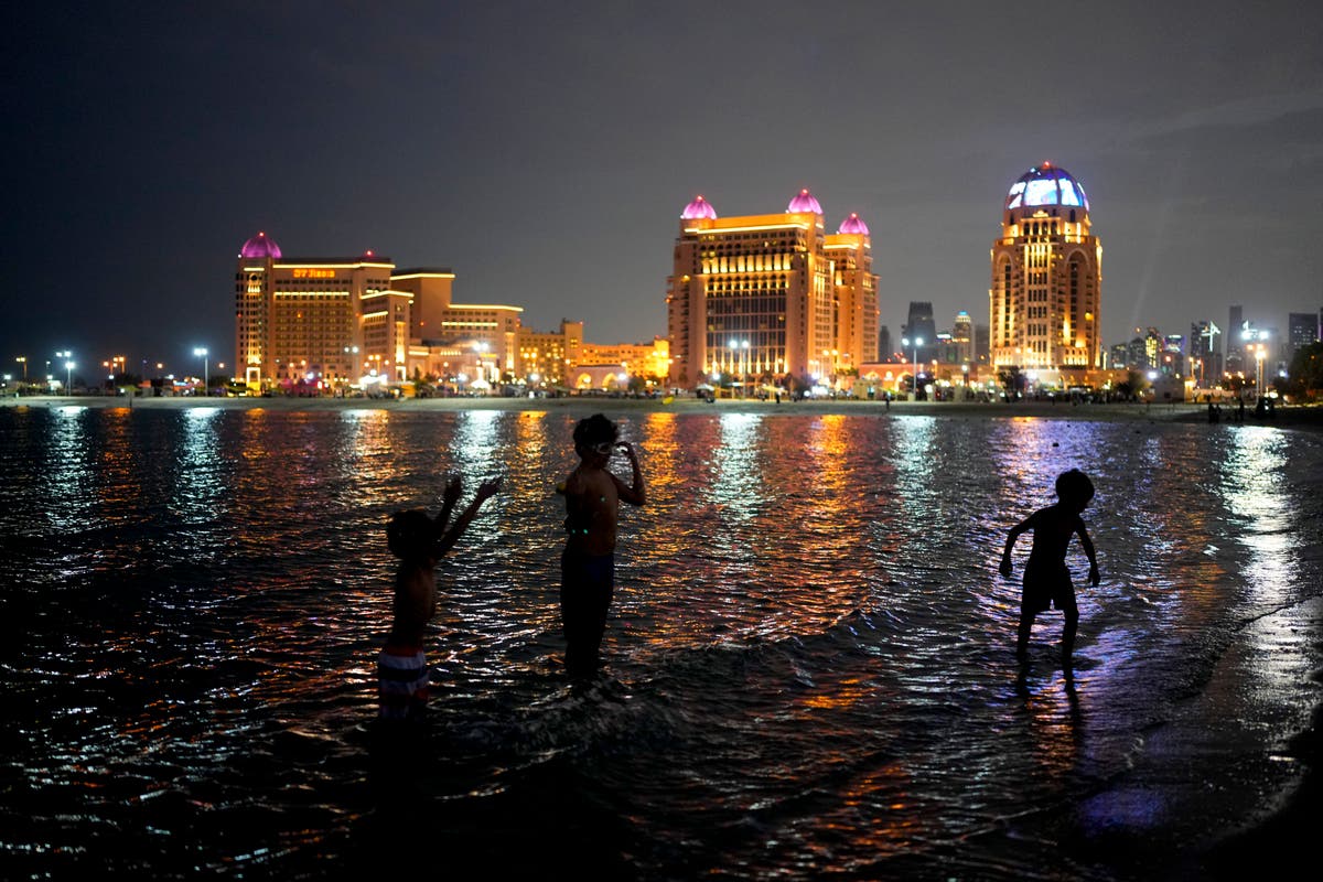 AP PHOTOS: Qatar bustles with life as World Cup nears end
