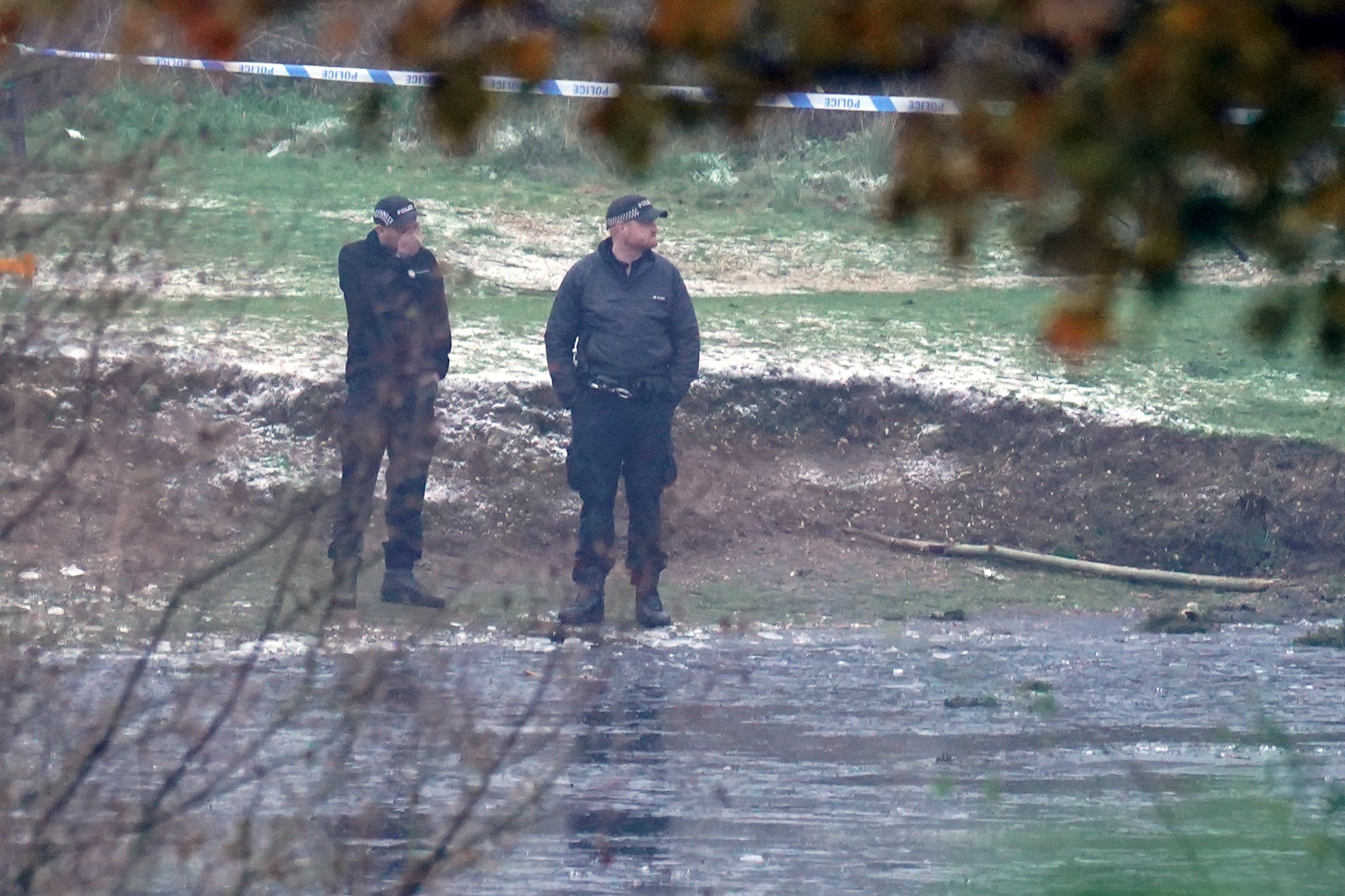 Police officers at the scene in Babbs Mill Park in Kingshurst, Solihull (Jacob King/PA)