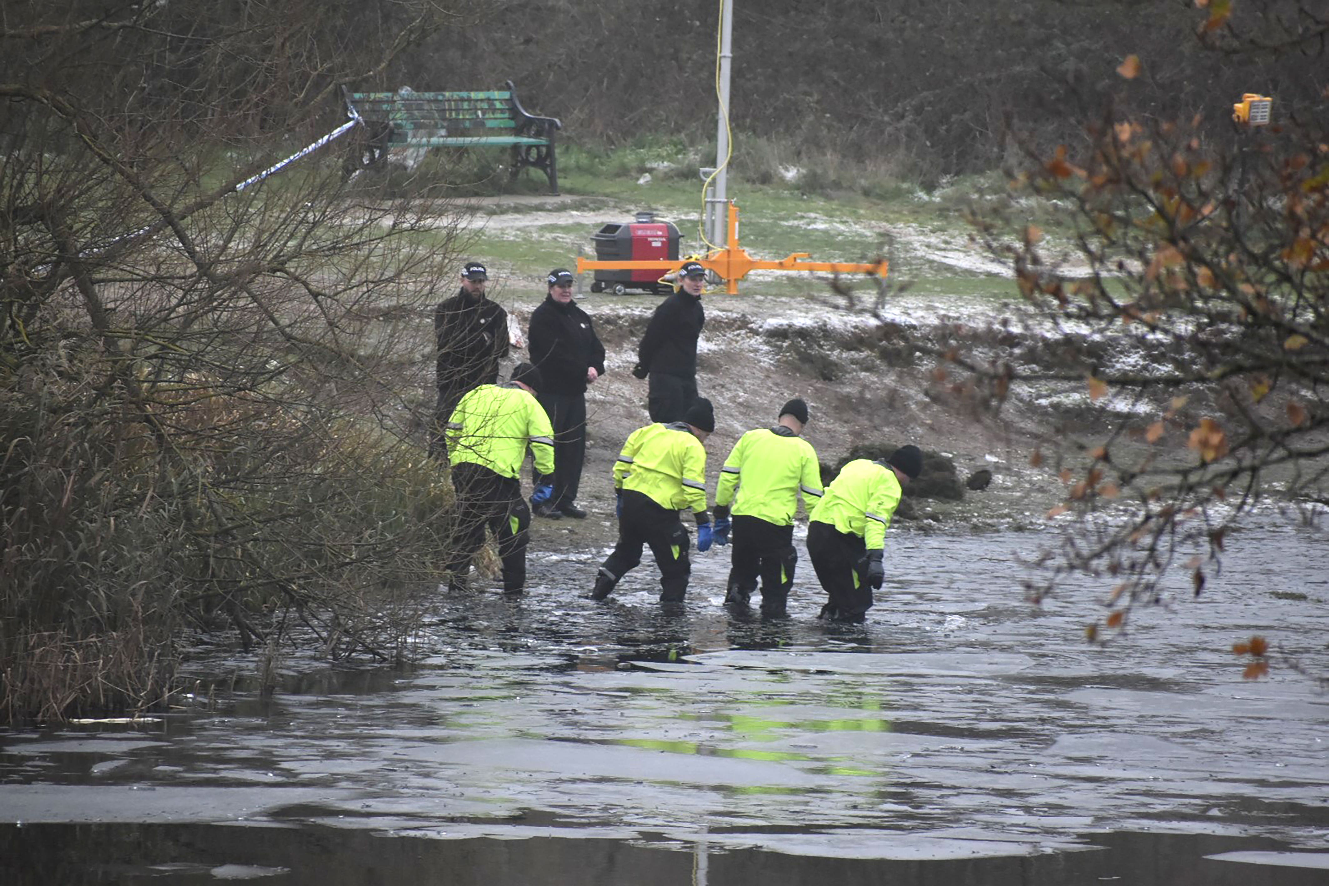 The boys aged eight, 10 and 11 died after falling through ice into a lake in Solihull in the West Midlands (PA)