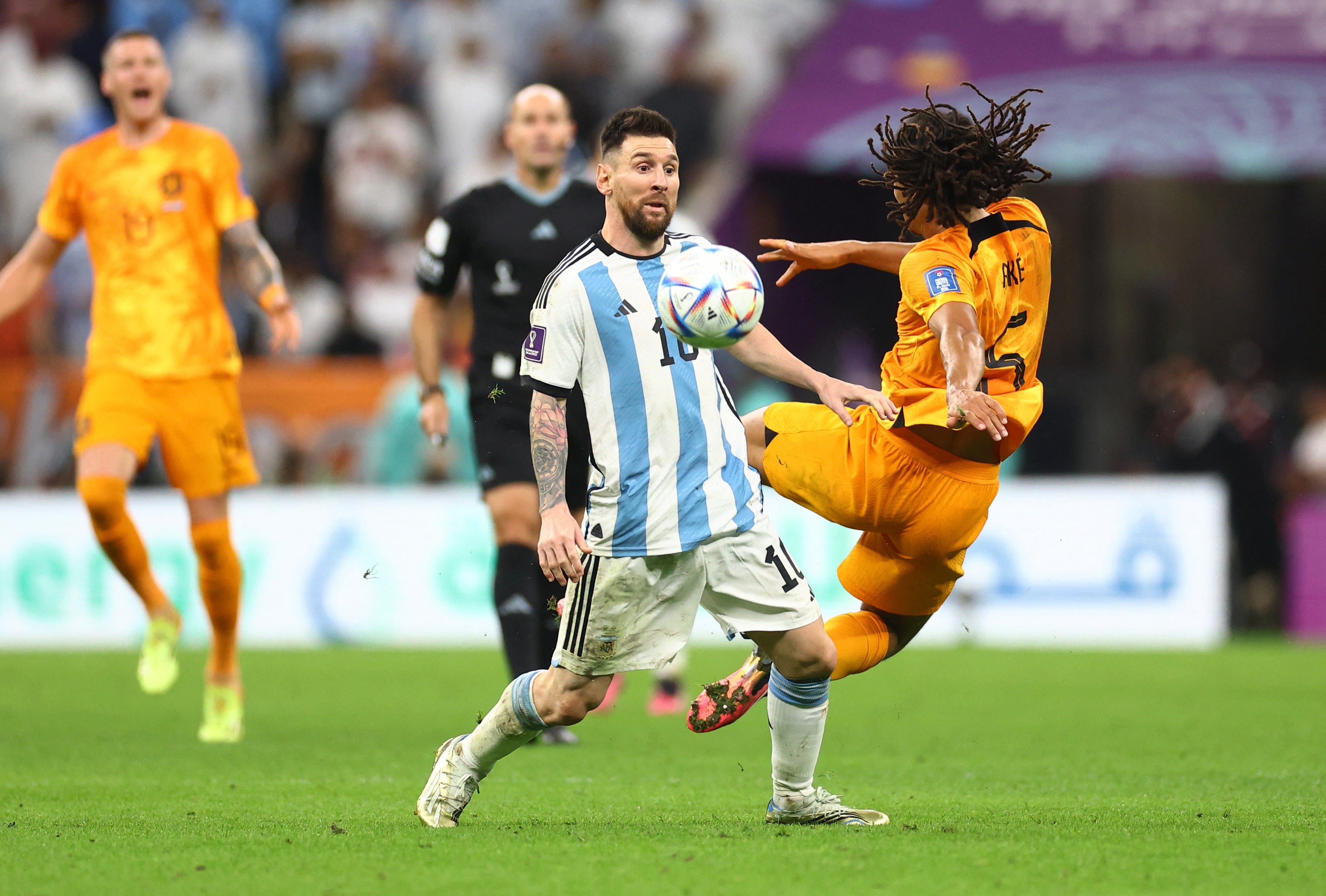 Messi in action against Netherlands defender Nathan Ake