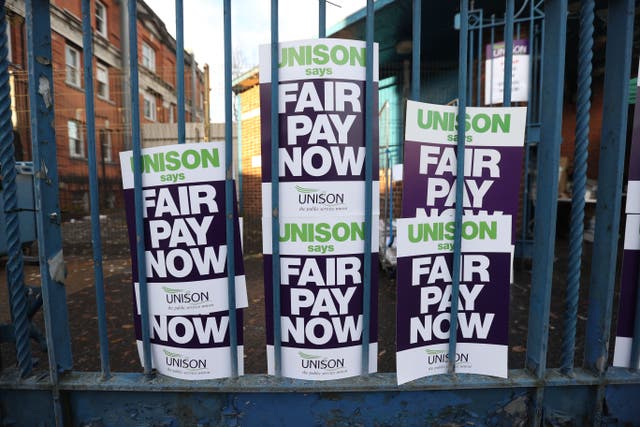 Unison members stage a 24 hour strike outside the Royal Victoria Hospital in Belfast, Northern Ireland. Monday December 12, 2022 (Liam McBurney/PA)