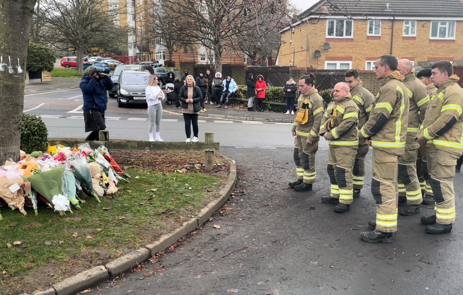 Members of West Midlands Fire Service have paid tribute to the three boys who died