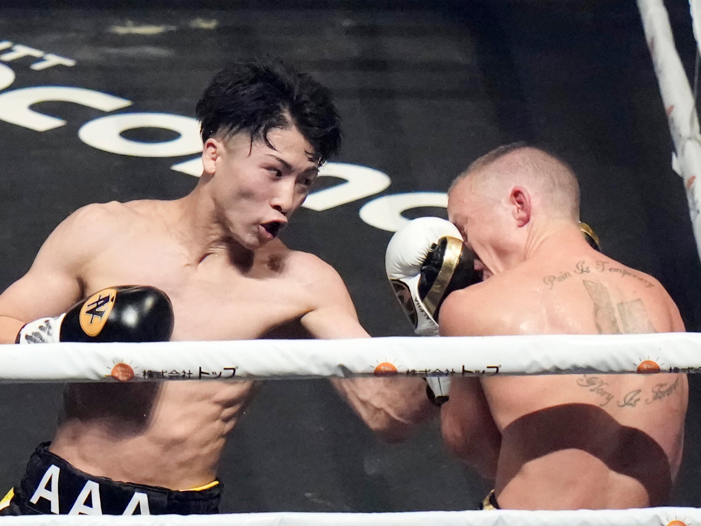 Naoya Inoue (left) stopped Paul Butler in Round 11 in Tokyo