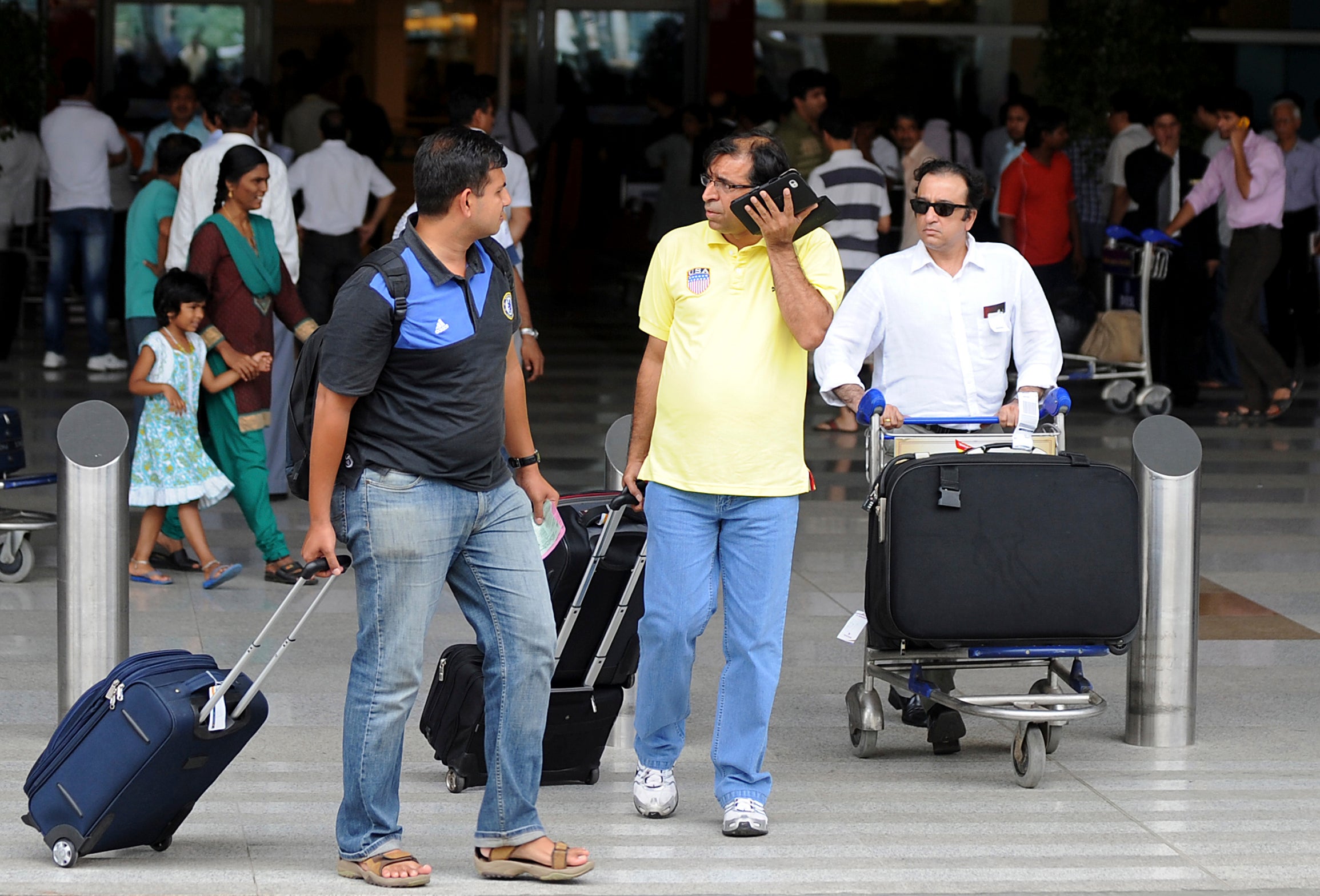 File: Passengers leave the Indra Gandhi International (IGI) airport in New Delhi