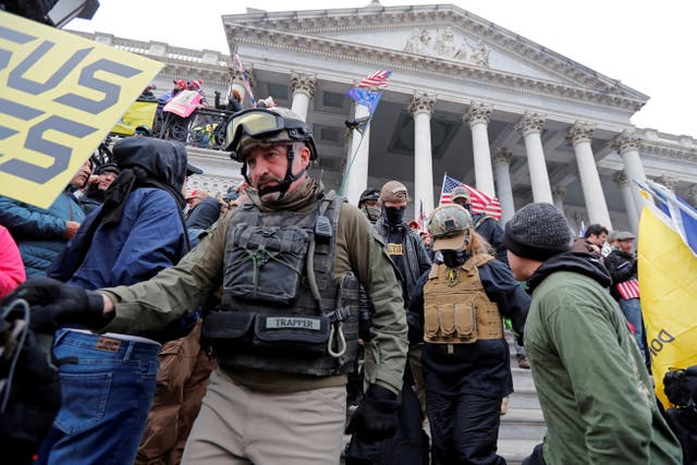 <p>File photo: Members of the Oath Keepers are seen among supporters of Donald Trump at the US Capitol during a protest against the certification of the 2020 US presidential election results by the US Congress, in Washington, US, 6 January 2021</p>