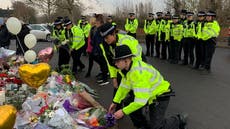 Tearful police pay silent tribute to boys who died in Solihull lake tragedy
