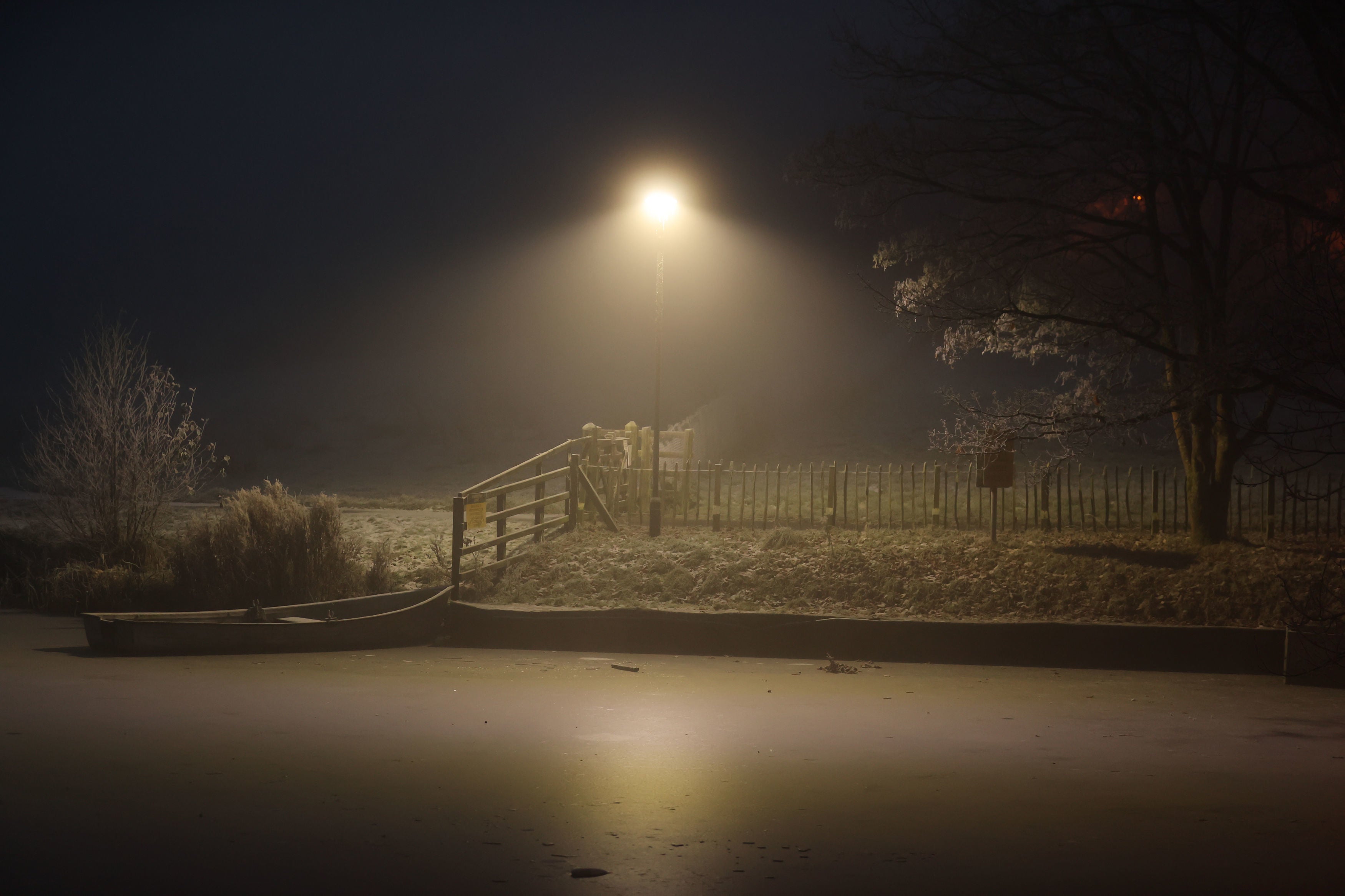 A light reflects on a frozen lake at Dungannon Park, County Tyrone in Northern Ireland