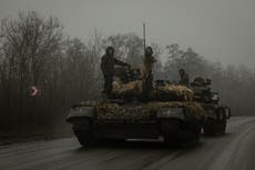 Ukraine news – live: Blasts rock Kyiv as 11 Iranian drones ‘shot down’