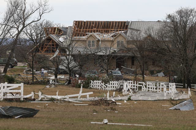 <p>A home after a possible tornado swept through near Decatur, Texas on 13 December</p>
