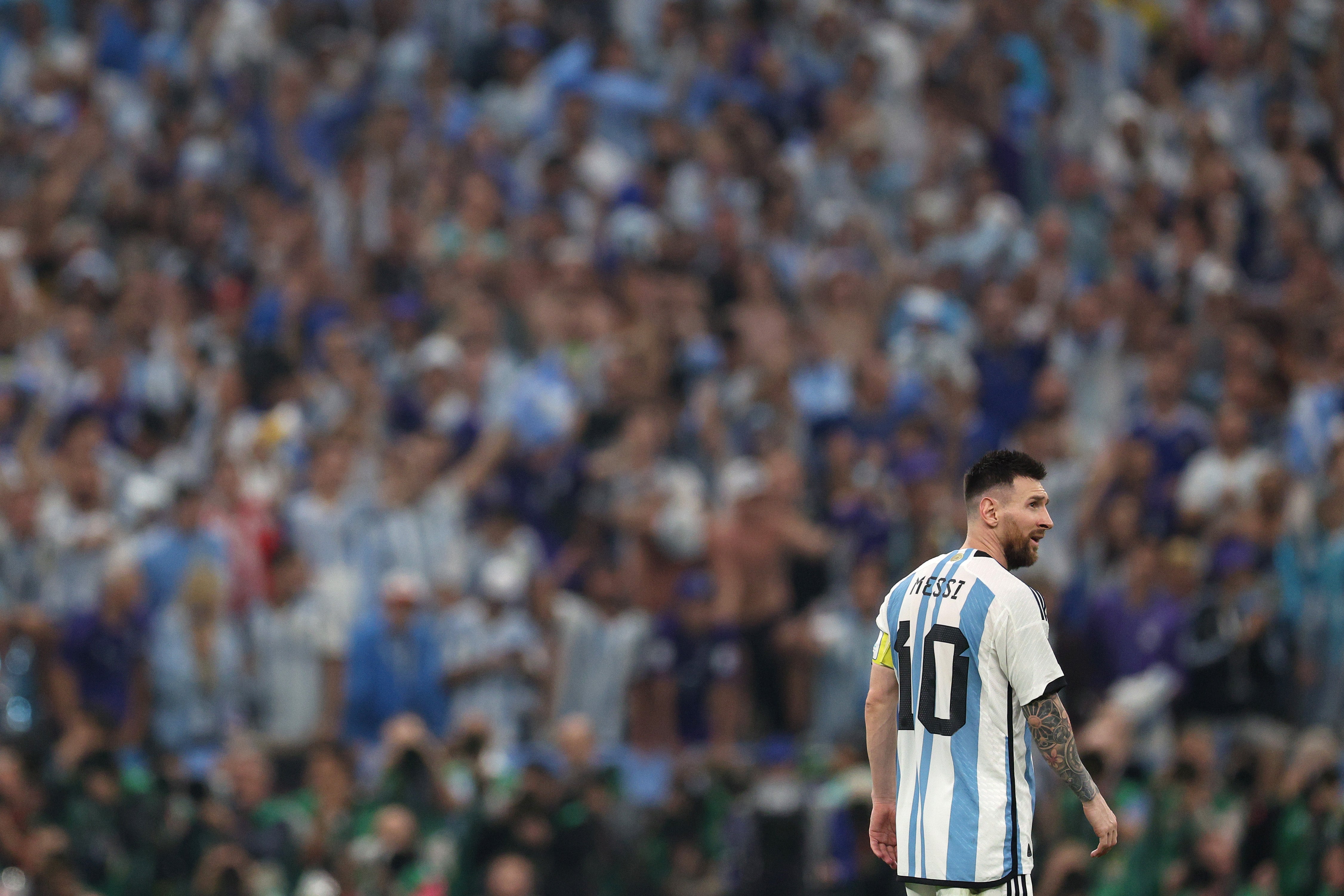 Fans watch on as Lionel Messi plays in the World Cup semi-final