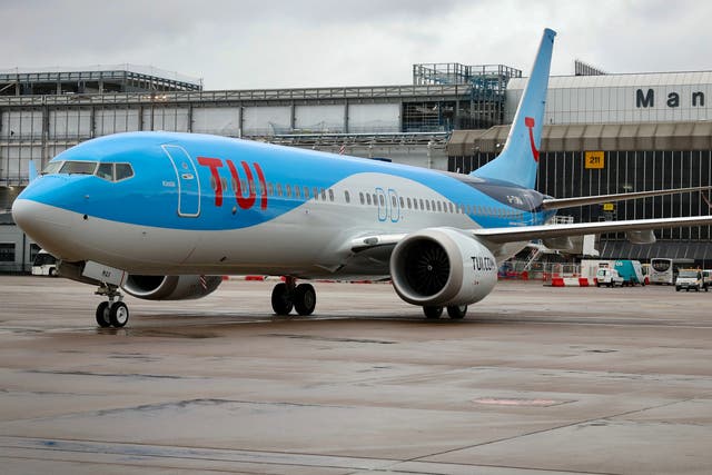 <p>Holidays higher: Tui Boeing 737 Max at Manchester airport</p>