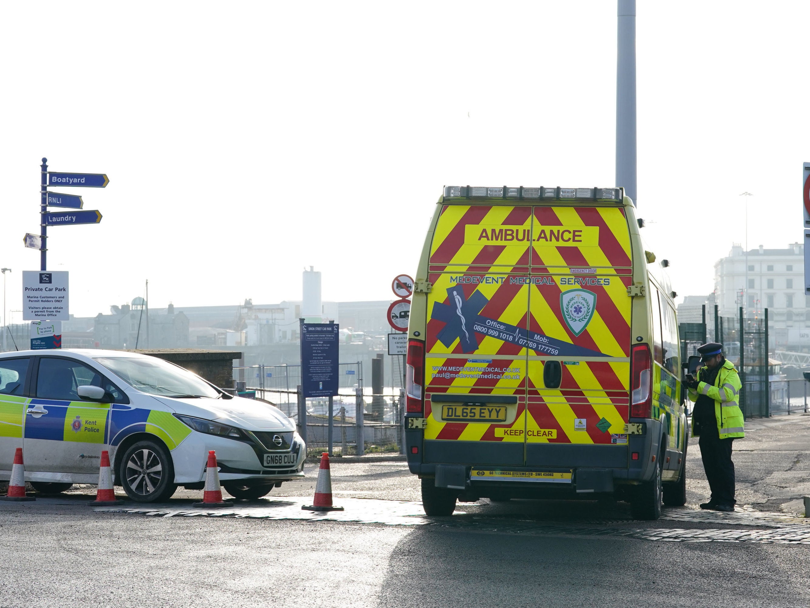 An ambulance arrives at the Port of Dover after a large search and rescue operation launched in the Channel