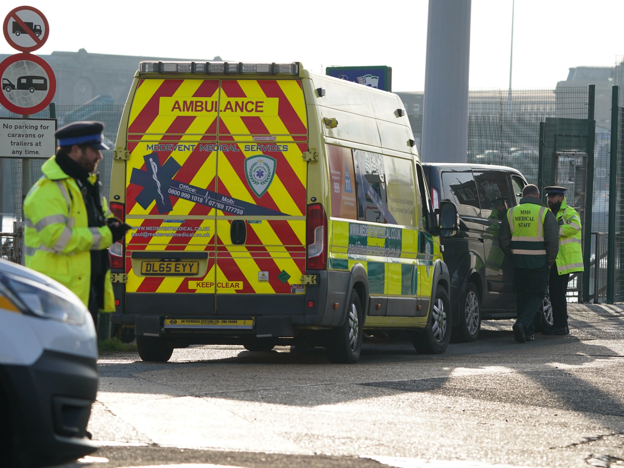 An ambulance arrives at the Port of Dover after a large search and rescue operation launched in the Channel