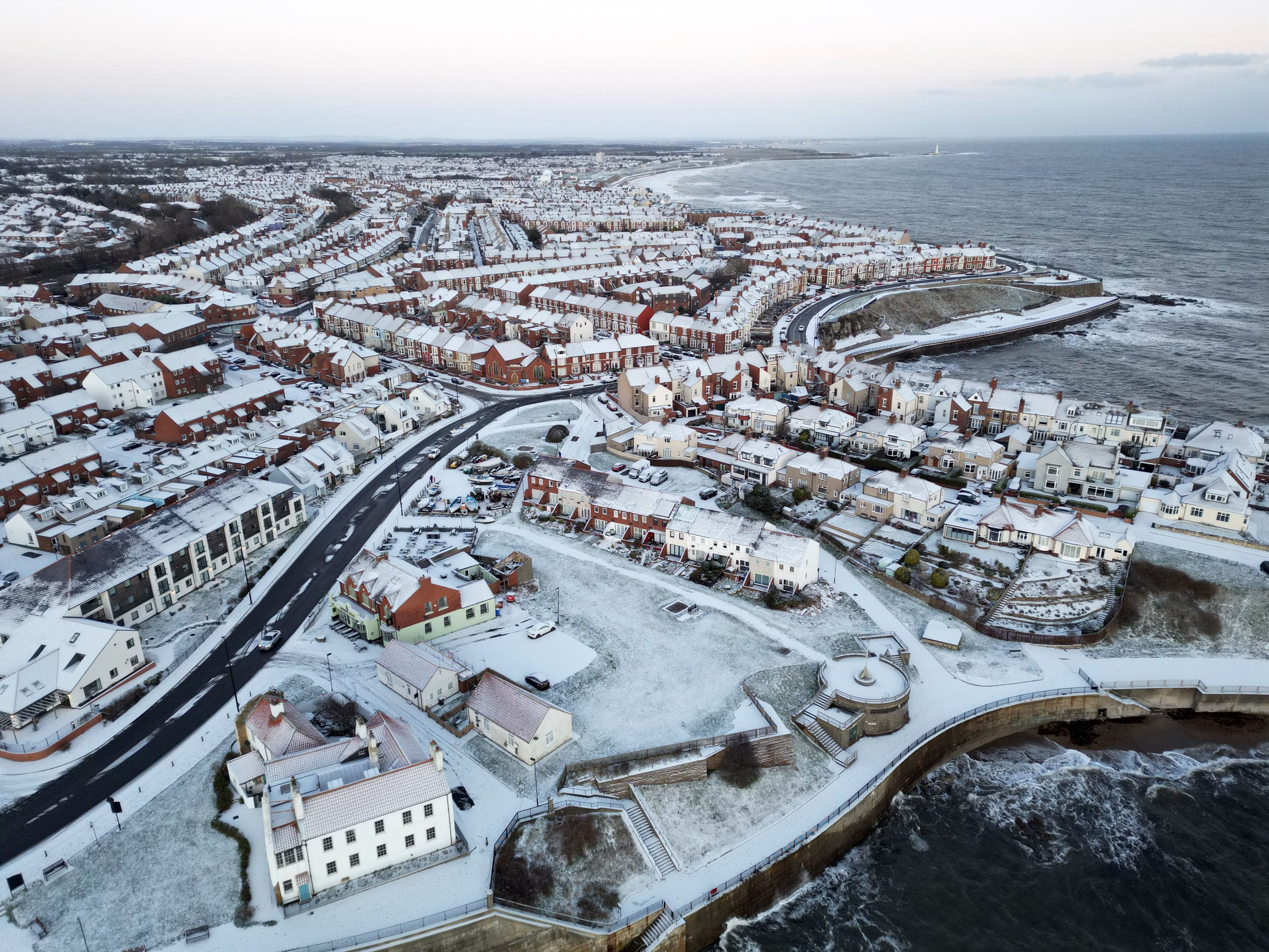 Overnight snow at Cullercoats Bay in North Tyneside