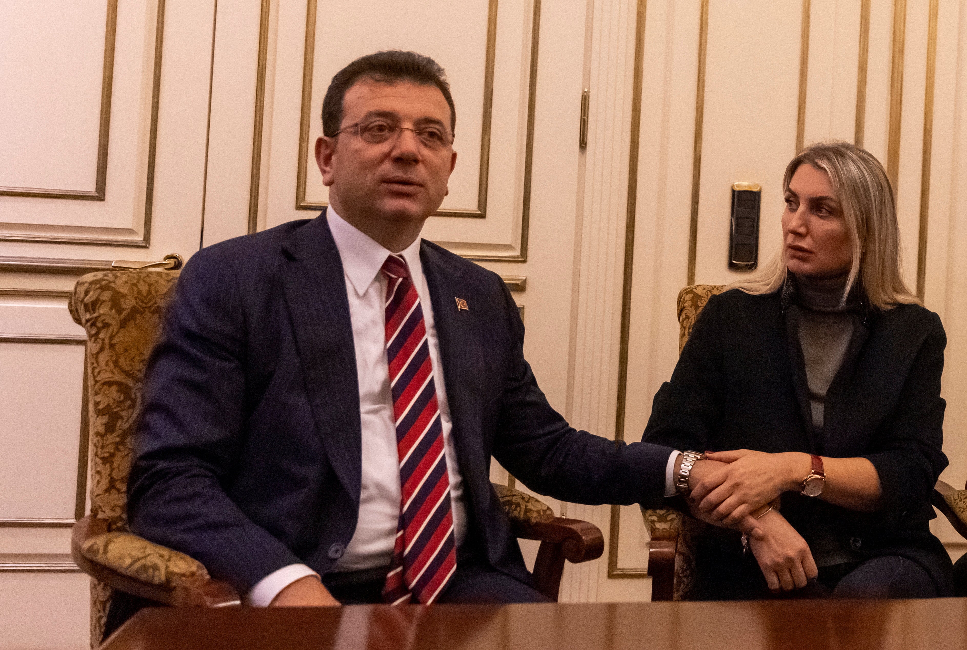 Istanbul mayor Ekrem Imamoglu and his wife Dilek sit at his office as a Turkish court sentenced him to more than two years in prison