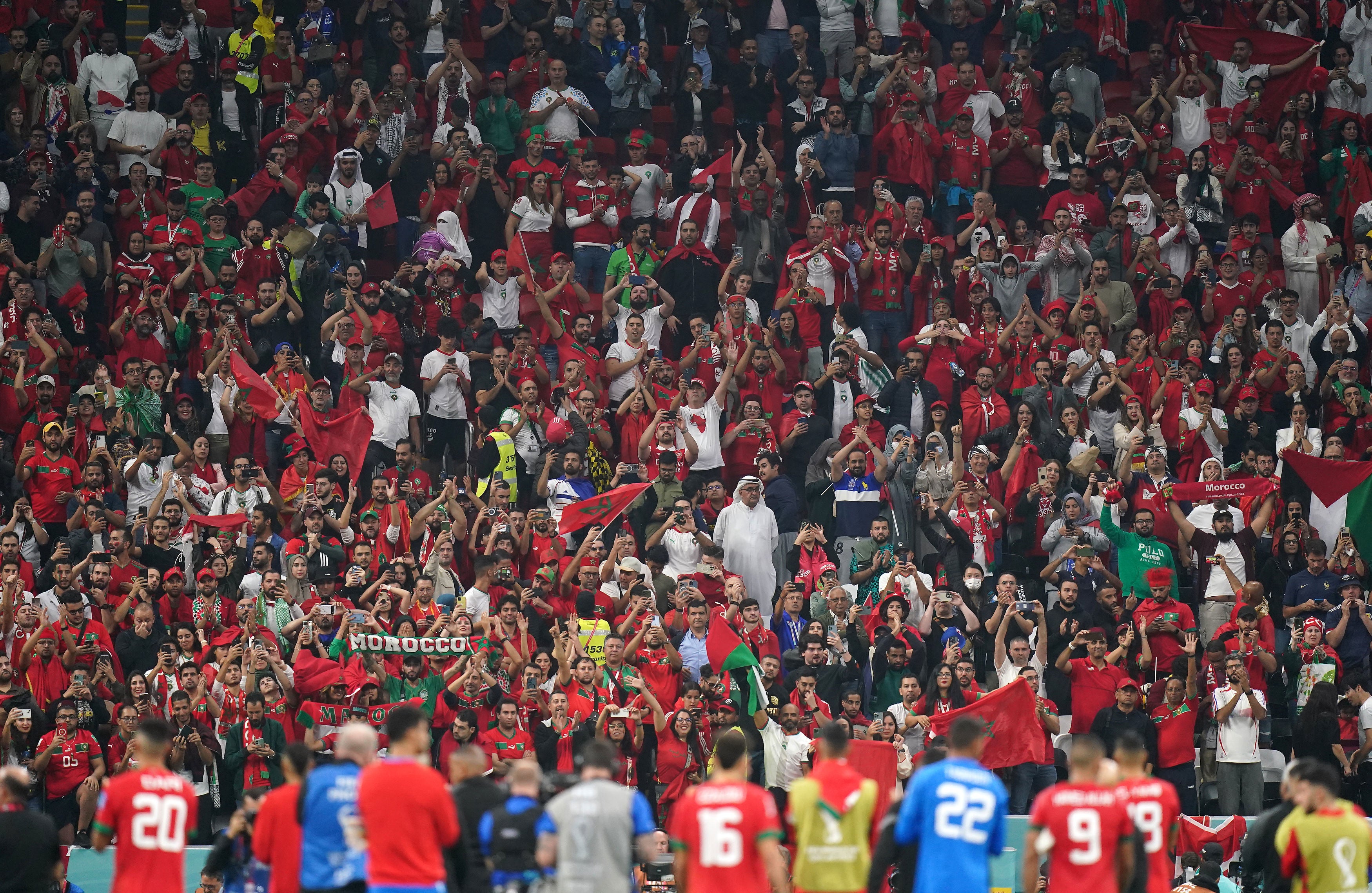 Moroccan fans salute their players after the final whistle