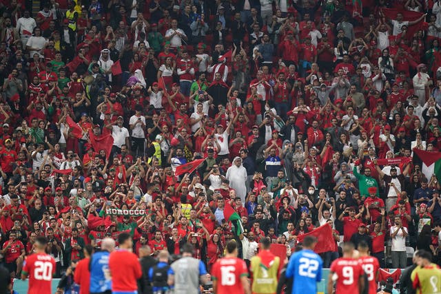 <p>Moroccan fans salute their players after the final whistle</p>
