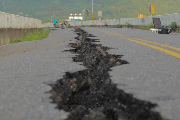 File: A fissure is seen along a road by the collapsed Kaoliao bridge in eastern Taiwan’s Hualien county on 19 September 2022, following a 6.9 magnitude earthquake on 18 September